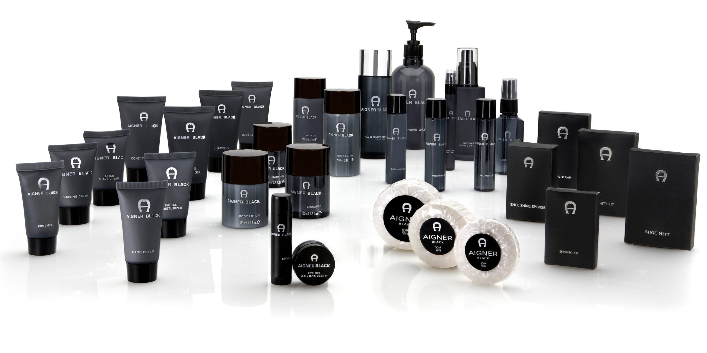 The Aigner Black amenity range &mdash; wet amenities, grooming products, dry amenities and vanity kits