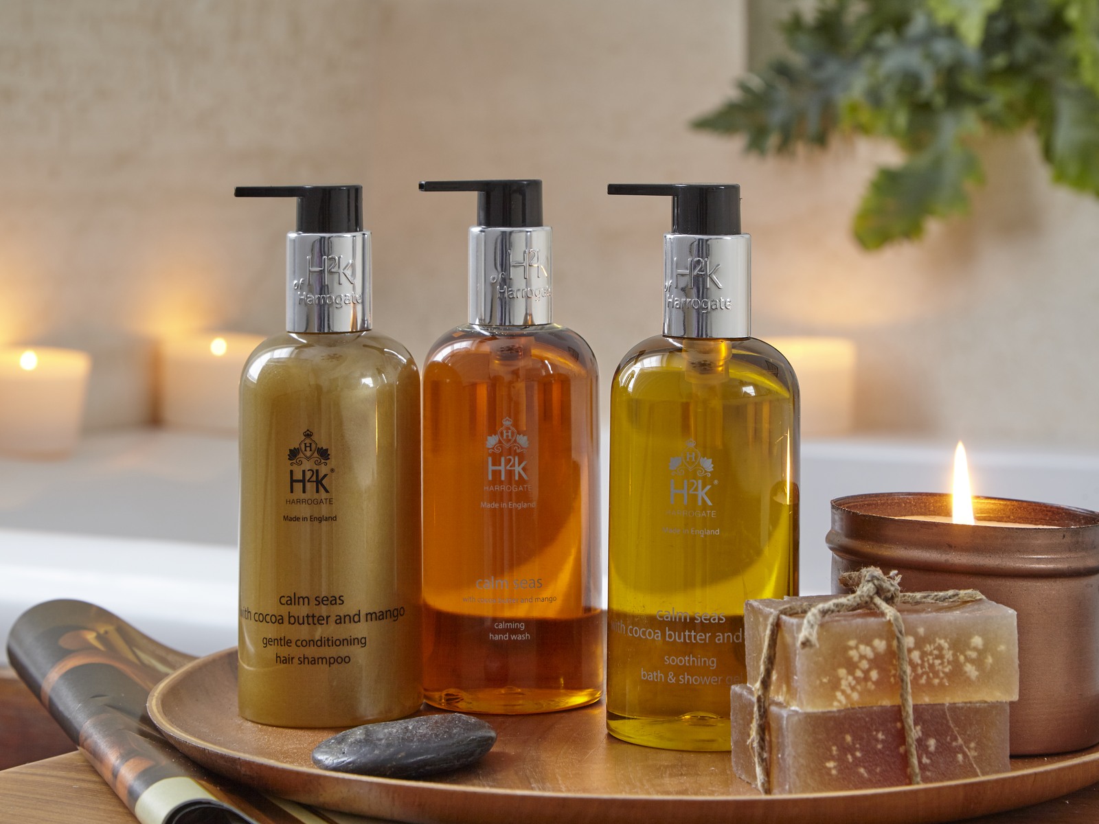 The H2K Botanicals range — hand and body wash, lotion, candle and reed diffuser with calla lilies