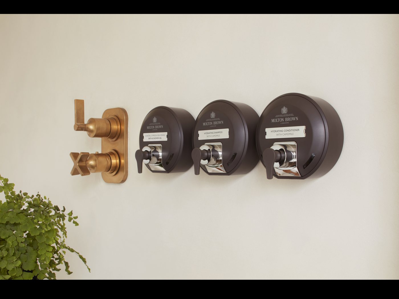Molton Brown signature wall-mounted dispensers with concealed cartridges