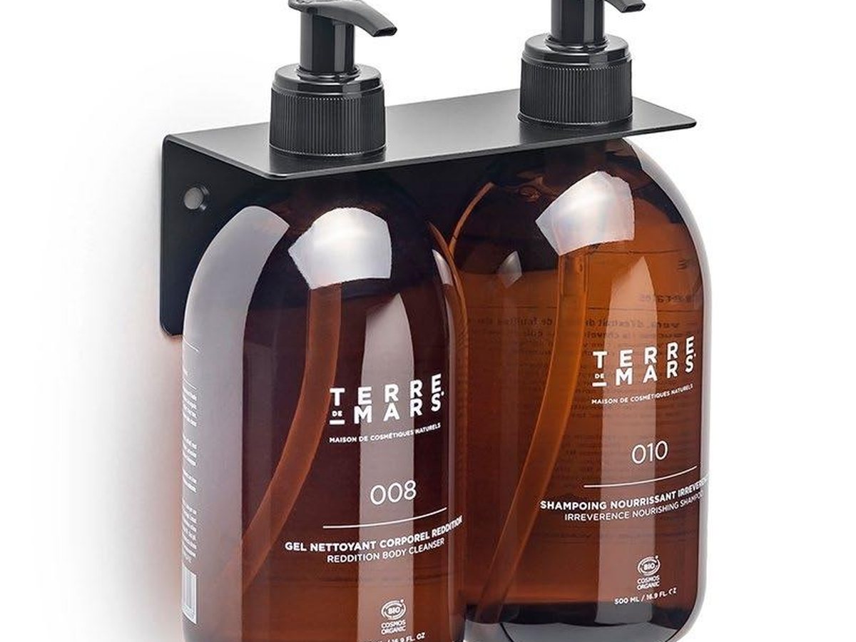 Two Terre de Mars 500ml bottles on a black stainless steel double holder
