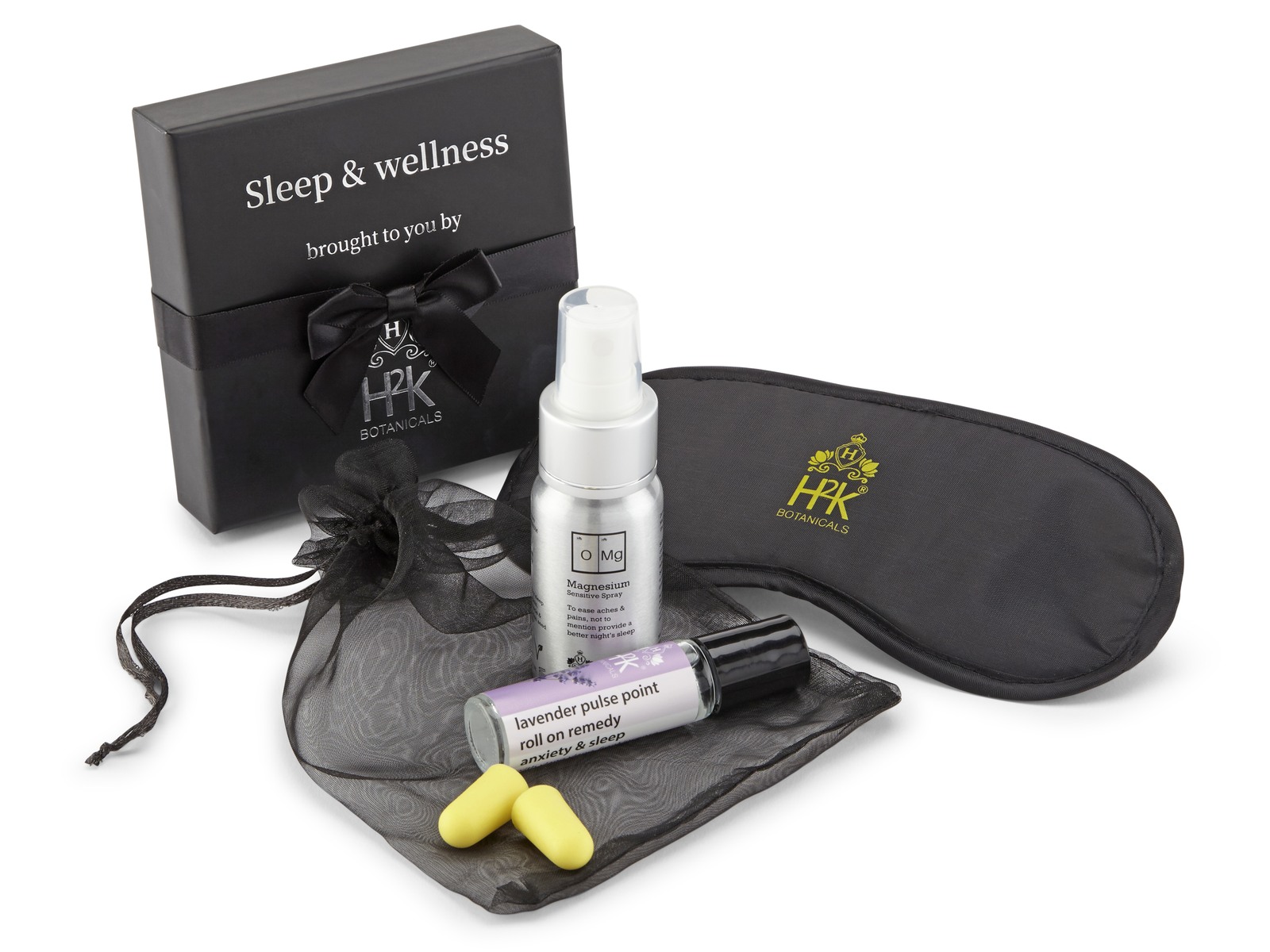 The H2K Sleep & Wellness turndown box &mdash; magnesium sensitive spray, lavender pulse point roll-on for anxiety and sleep, a branded eye mask, ear plugs and an organza pouch